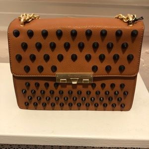 Foley and Corinna spiked bag